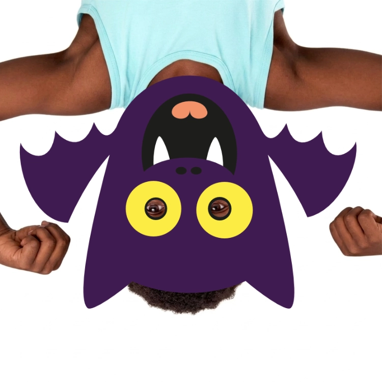 Child wearing a printable bat mask