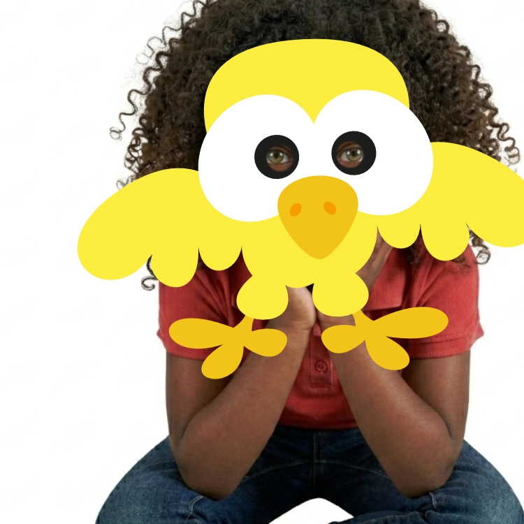 Girl wearing a printable chick mask
